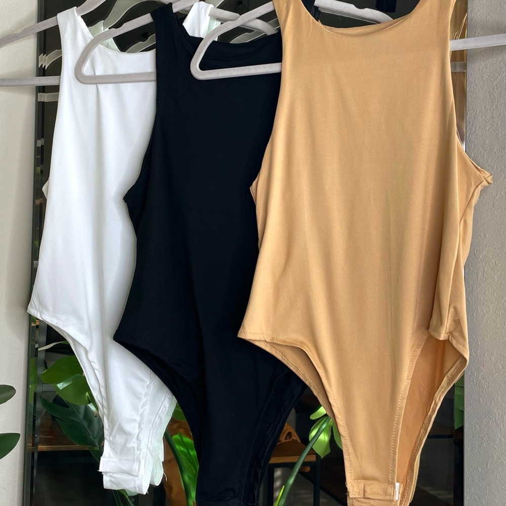 High Neck Bodysuit. NWT.
